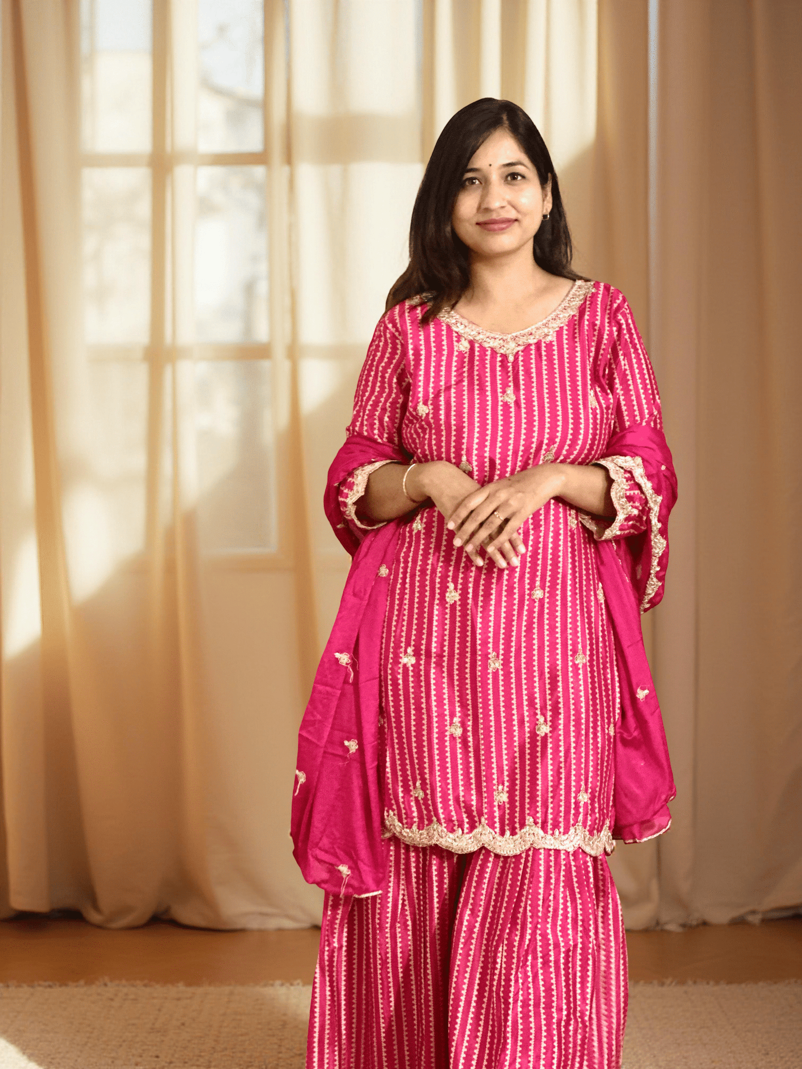 Vibrant Pink Sharara set with golden lace detailing